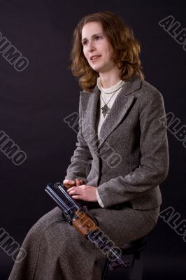 businesswoman with submachine gun