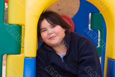 Girl In Playground Equipment