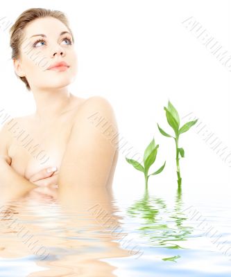 clean lady in water with green plants 2