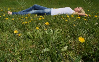 Woman lying on grass