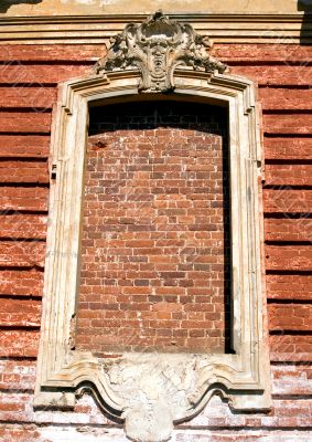 The old window immured by a bricklaying