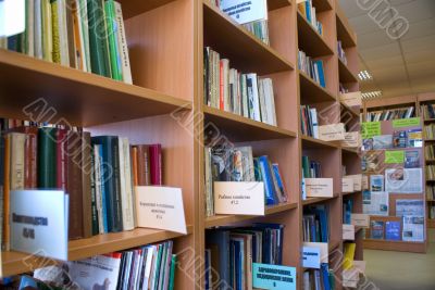 books on shelves in library