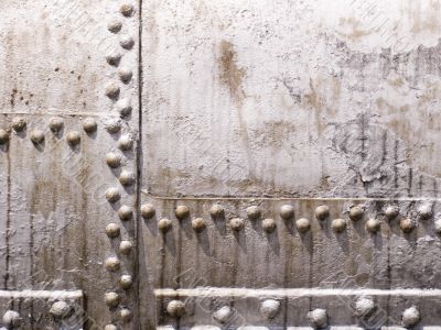 old metal tank with rivets