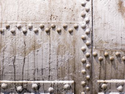 old metal tank with rivets