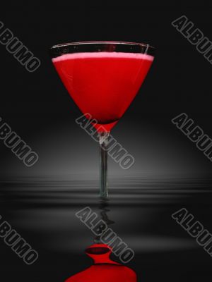 red martini glass in water
