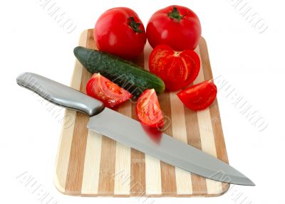 Vegetables on cutting board.