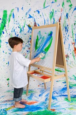 Boy playing with painting