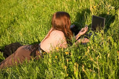 Girl,grass,laptop