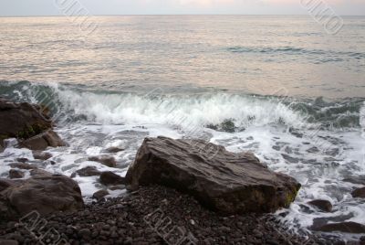 Waves splashing on seacoast
