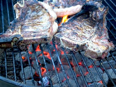Grilled T-Bone Steaks Still Cooking