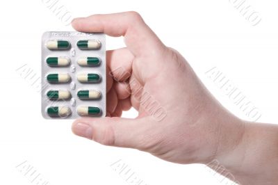 Hand,green pills