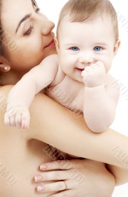 clean happy baby in mother hands