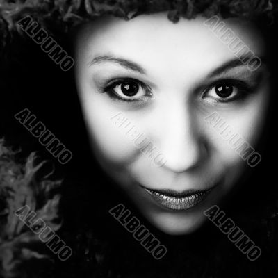 Young woman looking straight into the lens