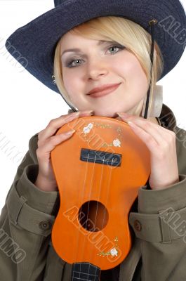 blond with small guitar