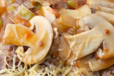 mushrooms, cheese and vegetables in sauce