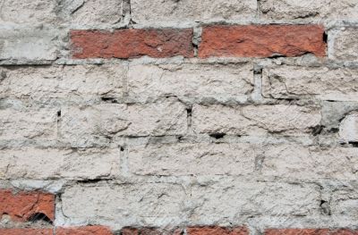 The old shabby brick wall