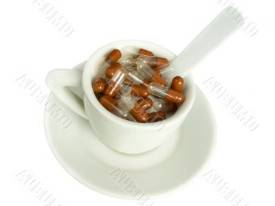 Pills are in a cup