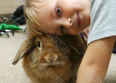 The boy with the rabbit