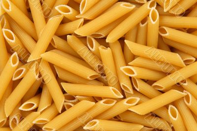 Penne rigate pasta background