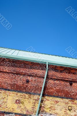 Brick Wall Green Gutter