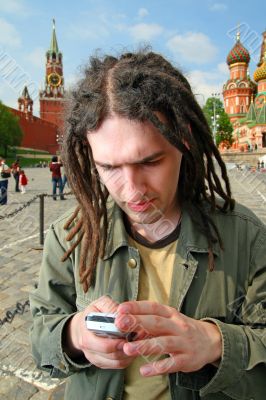 Young man with dreadlock hair.