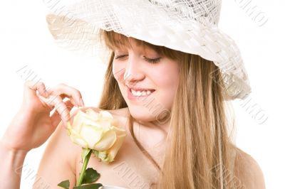 blonde woman with tea rose