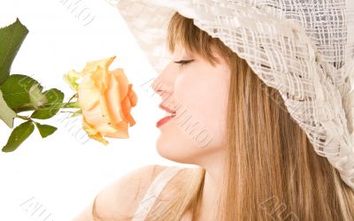 blonde woman with tea rose