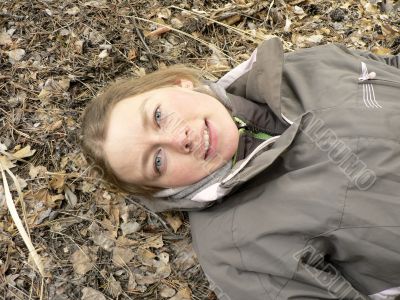 girl laying on the ground