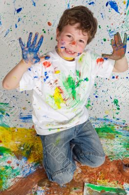 Boy playing with painting
