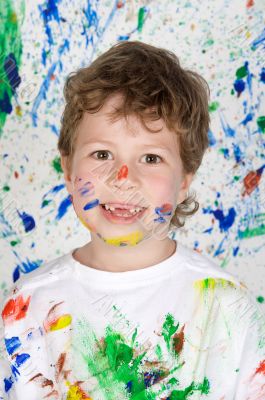 Boy playing with painting