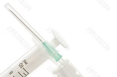 Syringe on white