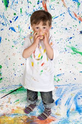 Boy playing with painting