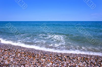 waves on empty sea beach