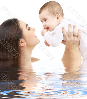 happy mother with baby boy in water #2