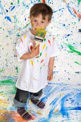 Boy playing with painting