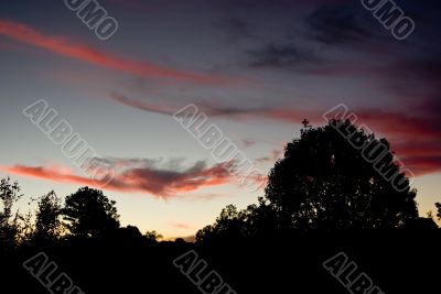 Spectacular Cloudy Sunset over the trees