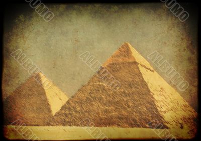 Grunge background with Egyptian pyramids