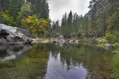 The foggy sky above lake.