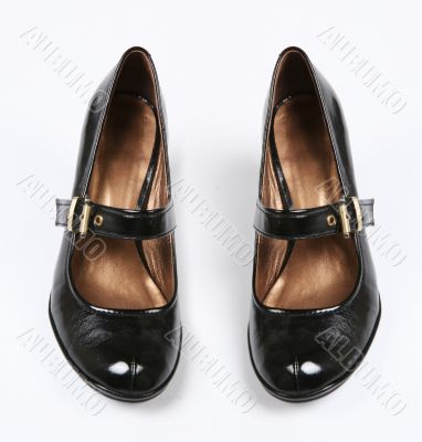 female black varnished shoes