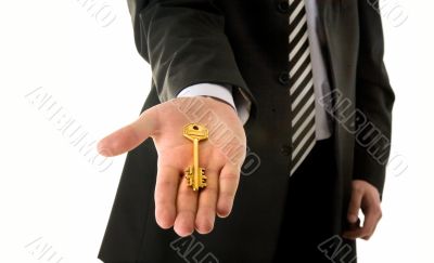 Businessman holding key