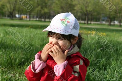 little girl happy smilling in spring park