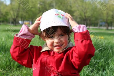 little girl happy smilling in spring park