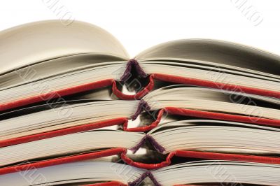 Stack of open books