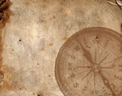 Compass on the old paper
