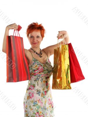 Shopping. Happy woman with different bags with purchases