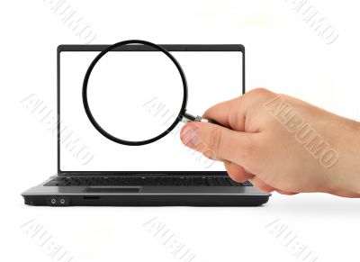 hand with blank magnifying glass and notebook