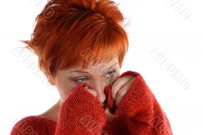 sad red haired woman isolated on white background