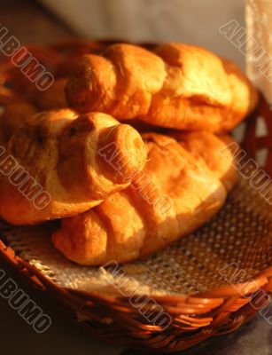 fresh croissants in basket