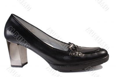 Black shoe on high mirror heel