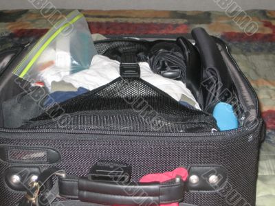 Luggage in hotel room